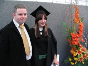 Anna in Cap and gown after graduation from WIT